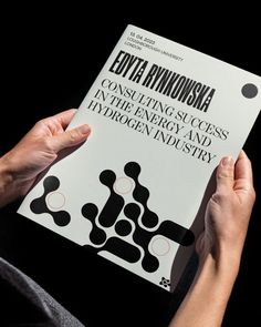 a person holding up a book in their hands with the title enta anninosia consulting success in the energy and hydrogen industry