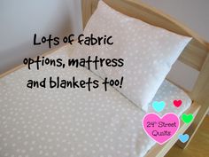 an image of a bed with hearts on it and the words let's of fabric options, mattresses and blankets too