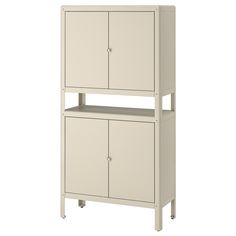 a tall white cabinet with two doors on the top and one door open to reveal a shelf