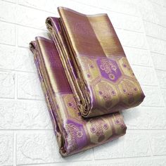 For any questions Whatapp Us: +4591718558 Visit www.silktatva.com for extra discounts Lavender Kanchipuram/Kanjivaram Handloom Floral Tissue Brocade Meenakari Silk Saree Beautiful saree with all over Gold and Silver Zari brocade weaving in the body of the saree in traditional floral design Heavy Pallu with full Zari weaving This saree is woven from pure mulberry silk thread. Truly a Masterpiece for your Saree collection for the generations to come 100% Pure Kanchipuram Handloom Saree Silk Mark c Brocade Designs, Saree Silk, Traditional Saree, Saree Models, Traditional Sarees, Silk Thread, Beautiful Saree, Handloom Saree, Saree Collection