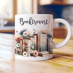 there is a coffee mug with books on it