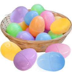 a basket filled with lots of colorful plastic eggs