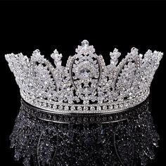 a tiara is shown on a black surface