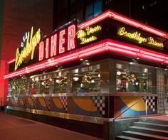 the diner is lit up and ready for customers to eat it's own menu