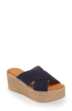 An espadrille-style wedge keeps your summery look classic in a slide sandal with suede straps that cross at the vamp. 2 3/4" heel; 1 3/4" platform (size 39) Cushioned footbed Leather upper/leather and textile or leather lining/synthetic sole Made in Spain Women's Shoes Summer Suede Slip-on Espadrilles, Summer Suede Open Toe Espadrilles, Suede Sandals With Woven Sole For Beach, Vacation Suede Sandals With Woven Sole, Espadrille Slip-on Wedge Sandals For Vacation, Beach Mules With Cushioned Footbed And Wedge Heel, Suede Open Toe Espadrilles With Cushioned Footbed, Suede Platform Wedge Sandals For Vacation, Suede Wedge Sandals For Vacation