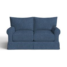 a blue couch sitting on top of a white floor