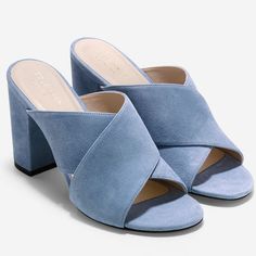 3.5 Inch Heel Light Blue Block Heel Sandals With Padded Heel, Light Blue Sandals With Padded Block Heel, Light Blue Sandals With 4-inch Heel For Spring, Elegant Blue Open Heel Mules, Blue Block Heel Mules For Summer, Summer Blue Block Heel Mules, Elegant Blue Open Toe Mules, Elegant Blue Mules For Spring, Blue Suede Slip-on Mules