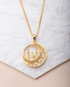 Inspired by the beautiful mosques from all around the world. This necklace features a 2 minaret mosque embossed throughout the design, with a gorgeous curved embezzled line Material: 925 Sterling Silver with 3.0 Microns of Pure 18K gold Chain: 40 CM + 10CM Extension Eid Adha, Arabic Jewelry, Love Couple Wallpaper, Islamic Jewelry, Adha Mubarak, Edgy Jewelry, Mecca Wallpaper, Eid Gift, 18k Gold Chain