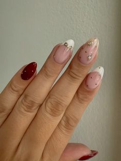 Thanksgiving nails inspo, holiday nails 2024, holiday inspo nail designs, bow design nail inspo, nail design inspo, nail design with rhinestones, red and french tip nails, gold bow nails, almond nail designs Easy New Year Nail Designs, Almond Acrylic Nails New Years, New Years Eve Nails Ideas Simple, Cute Valentines Nails Almond Shape, Maroon With Gold Nails, New Years Gel X Nails, Flower And Bow Nails, Almond Nail Inspo Christmas, Fun Nye Nails