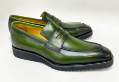 Calfskin Slip-On Penny Loafer Olive Gorgeous Calfskin slip-on Penny Loafer from our Exclusive Maurice collection features full Leather Lining, a clean welt and a tone on tone Lightweight Rubber Sole! Fitted Green Leather Shoes With Leather Sole, Classic Green Leather Shoes For Galas, Green Formal Slip-ons With Round Toe, Green Almond Toe Dress Shoes With Rubber Sole, Green Slip-on Leather Shoes For Galas, Green Plain Toe Loafers With Leather Sole, Green Leather Sole Loafers With Plain Toe, Green Dress Shoes With Rubber Sole For Office, Office Green Dress Shoes With Rubber Sole