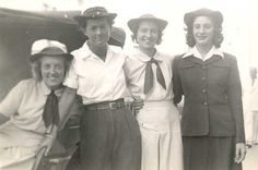 an old black and white photo of four women