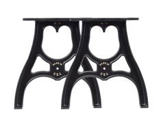 pair of black iron side tables with gold accents on the top and bottom, against a white background