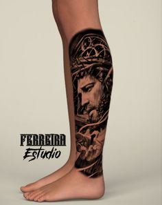 a person with tattoos on their legs is shown in the image, and has his leg tattooed