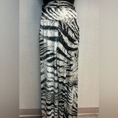 This Striped Zebra Palazzo Pant Is The Perfect Way To Stand Out! Featuring A 3” Pull-On Soft Waistband And Ultra-Flattering Wide-Leg Silhouette That Naturally Flows Against The Body. Shades Of Black And Grey-Taupe Help To Create A Unique Striped Zebra Print, Over A Creamy-Beige Background With Subtle Hints Of Tan Spots. 3" Soft Waistband Each Piece Is A Unique, One-Of-A-Kind Print And Print Placement Will Vary. Casual Wide Leg Bottoms With Zebra Print, Spring Wide Leg Zebra Print Bottoms, Spring Wide Leg Zebra Print Pants, Summer Zebra Print Wide Leg Bottoms, Chic Summer Bottoms With Zebra Print, Casual Black Zebra Print Pants, Palazzo Pant, Print Placement, Beige Background