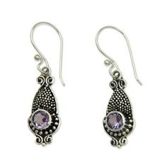 Bali artisan Wayan Asmana was reminded of squid when crafting these sterling silver earrings with their unusual shape. The earrings feature traditional Balinese dot motifs accented by a darkly oxidized background. Completing the design are sparkling lilac-hued amethysts..925 Sterling silver Ornate Purple Dangle Earrings, Ornate Purple Sterling Silver Earrings, Amethyst Dangle Earrings Stamped 925, Ornate Purple Pierced Earrings, Bohemian Purple Sterling Silver Earrings, Traditional Purple Drop Earrings, Traditional Purple Dangle Earrings, Traditional Purple Teardrop Jewelry, Purple Sterling Silver Drop Earrings