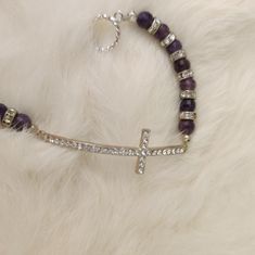 Handmade Jewelry New Without Tag Silver Cross And Purple Shiny Beads Chain Approximately 3" Long Adjustable Silver Beaded Bracelets With Cross Shape, Adjustable Silver Cross Beaded Bracelets, Adjustable Silver Beaded Cross Bracelets, Elegant Silver Cross Beaded Bracelets, Elegant Silver Beaded Cross Bracelets, Silver Cross Jewelry With Beads, Elegant Adjustable Cross Beaded Bracelets, Adjustable Silver Crystal Bracelet With Beaded Chain, Handmade Charm Bracelets