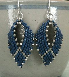 a pair of blue and silver beaded earrings