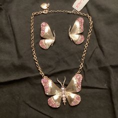 Betsey Johnson Large Gold Tone With Rhinestone Necklace Tones Of Pink Necklace Is 17+ 3 In Extenderlobster Clasp Necklace Has Tag Earring Are Not On Card Earrings Are Pierced Evening Metal Jewelry Sets With Rhinestones, Evening Rhinestone Metal Jewelry Sets, Pink Rhinestone Jewelry Set For Party, Pink Bling Jewelry For Evening, Pink Evening Jewelry With Bling, Evening Pink Bling Jewelry, Pink Jeweled Jewelry Sets For Party, Card Earrings, Clasp Necklace