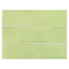 a light green brick wall with white lines