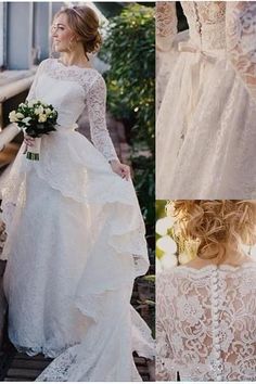 a woman in a wedding dress is standing on the steps with her hands behind her back