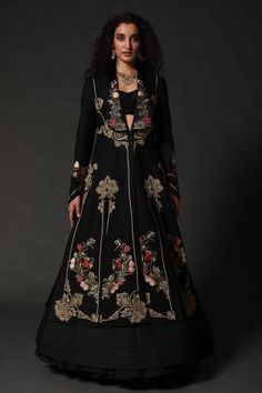 Black matka silk long jacket with floral, paisley embroidered motifs and full sleeves.
Component: 1
Pattern: Embroidered
Type Of Work: Floral
Neckline: Shawl Lapel
Sleeve Type: Full Sleeves
Fabric: Matka Silk, Lining: Silk
Color: Black
Other Details: 
Floral motifs
Note: Skirt and crop top worn by the model is not for sale
Occasion: Sangeet - Aza Fashions Luxury Floor-length Blouse With Resham Embroidery, Luxury Long Sleeve Unstitched Suit With Floral Embroidery, Luxury Long Sleeve Traditional Wear With Embroidered Sleeves, Luxury Long Sleeve Outerwear With Dabka Work, Luxury Long Embroidered Outerwear, Luxury Embroidered Long Coat, Luxury Floral Embroidery Outerwear For Eid, Luxury Black Outerwear With Floral Embroidery, Luxury Floor-length Blouse Piece With Intricate Embroidery