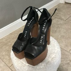 In Great Condition. Size 8 Brown Platform Heels For Night Out, Brown Platform Heels For A Night Out, Black Heels With Wooden Heel For Parties, Black Wooden Heel Party Heels, Black Party Heels With Wooden Heel, Brown Open Heel Shoes For Night Out, Brown Heels With Wooden Heel For Evening, Brown Leather Heels For Night Out, Formal Black Heels With Wooden Heel