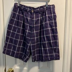 Womens Purple/Pink Plaid Long Pleated Shorts Purple Cotton Shorts With Pockets, Purple Cotton Pants For Summer, Purple Bottoms With Built-in Shorts And Short Inseam, Purple Cotton Bottoms Short Length, Purple Cotton Short Bottoms, Purple Bottoms With Built-in Shorts, Summer Purple Bottoms With Pockets, Casual Purple Shorts With Pockets, Casual Purple Cotton Shorts