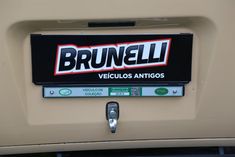 a license plate on the back of a vehicle that says brunelli venculos antigos