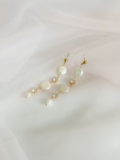 Wedding pearl earrings for bride. Gold earrings with cubic zirkonia and natural pearls. Pearl jewelry set includes bracelet with round natural pearl and two stones Wedding Earrings Gold, Gold Bridal Jewelry, Pearl Wedding Earrings, Gold Earrings Wedding, Gold Bridal Jewellery Sets, Pearl Earrings Wedding, Bridal Jewelry Set, Bracelet Pearl, Pearl Dangle Earrings