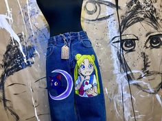 "Sailor Moon - jeans art - festive clothing- jeans with hand-painted - art on jeans - portrait- women's jeans - vintage jeans - OLD NAVY - L We will make similar jeans for you in any size on request jeans in stock! jeans are available to order! Vintage OLD NAVY - L 100% cotton measuring jeans: waist inches (half volume) length inches thighs inches (half volume) Under the order we will draw any drawings on jeans. Any size jeans of your choice. Write us a personal message and we will discuss every Hand Painted Denim Jeans For Streetwear, Hand Painted Straight Leg Cotton Jeans, Artistic Straight Leg Denim Jeans, Artistic Hand Painted Denim Bottoms, Artistic Hand Painted Straight Leg Bottoms, Artistic Hand Painted Denim Jeans, Blue Hand Painted Cotton Jeans, Trendy Hand Painted Cotton Jeans, Trendy Hand Painted Blue Jeans