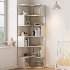 a white book shelf sitting in the corner of a room