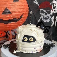 a cake decorated to look like a ghost