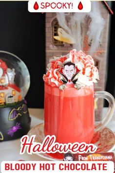 A red hot chocolate in a glass with a Dracula spoon in it. Healthy Party Drinks, Red Velvet Halloween, Red Velvet Hot Chocolate, White Chocolate Cream, New Drink, Halloween Drink, Creative Party Ideas, Hot Chocolate Recipe