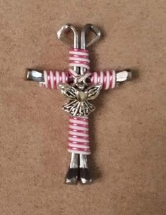 You design your cross,  free charm 😍 you pick your colors. Every cross sold I match and send a free cross in your name to our deployed overseas 💝 Handmade Cross Necklace For Gift, Personalized White Cross Necklace, Handmade Cross Necklace As Gift, Handmade Pink Cross Jewelry, Pink Cross Necklace For Gifts, Pink Cross Necklace For Gift, Multicolor Beaded Cross Jewelry, Nickel-free Cross Charm Necklaces As Gift, Adjustable Nickel-free Cross Pendant Jewelry