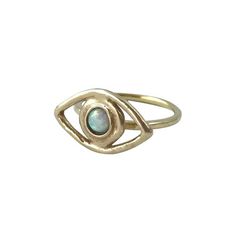 This unique ring was handmade using the lost wax casting process. Hand fabricated in wax, cast in brass, and set with opal. Handmade in Chicago by Therese Kuempel, each piece is unique and one of a kind.Stone measures 4mm.Please specify your ring size upon purchase.All of our brass is nickel free. Hand Forged Brass Rings With Spiritual Style, Spiritual Hand Forged Brass Rings, Gold Opal Ring With Spiritual Style, Spiritual Brass Moonstone Gemstone Ring, Unique Opal Gold Rings, Unique Gold Opal Rings, Opal Eyes, Crystal Ball Necklace, Ring Opal