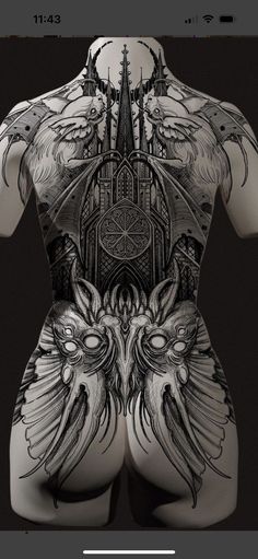 the back of a woman's body with tattoos on it and an image of a castle