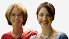 two women standing next to each other in front of a white background and one is wearing glasses