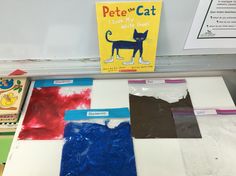 there is a book about pete the cat in front of some cut out pieces of paper