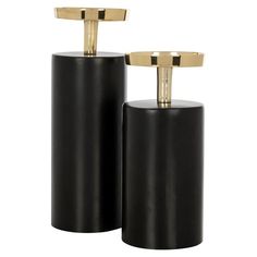 two black and gold salt and pepper shakers on a white background with clippings