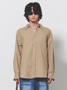 This is a comfortable and casual shirt made out of Japanese premium Ueyama checkered fabric. With minimal design detail including the trendy oversized silhouette, pleats detail on the center back, and 4 color thread checkered pattern, it gives a trendy and casual look. - Oversized silhouette- Pleat detail on the center back- 4 Color checkered pattern Classic Plaid Shirt For Daywear, Classic Plaid Tops For Casual Gatherings, Casual Gingham Shirt For Daywear, Relaxed Fit Plaid Shirt For Daywear, Casual Long Sleeve Top With Grid Pattern, Oversized Plaid Top For Daywear, Gingham Long Sleeve Tops For Everyday, Everyday Gingham Long Sleeve Tops, Everyday Long Sleeve Gingham Top