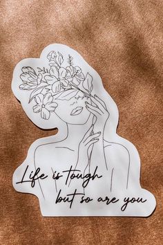 a sticker with the words life is tough but to are you written on it