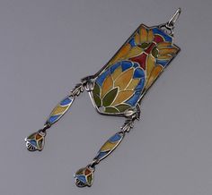 Please contact us before buying this item. Delicate and beautiful Jugendstil Plique-A-Jour sterling pendant C.1900. Jugendstil, also known as the German Art Nouveau style,  was an influential artistic movement that emerged  in the mid-1890s and lasted until around 1910. The pendant's red, blue, yellow, and green Plique-A-Jour patterns  represent ancient Egyptian theme with lotuses. The sterling frame continues Egyptian revival motif. The whole pendant is 3 1/8 inches (80 mm) long  28 mm wide inc Egyptian Theme, Art Nouveau Pendant, Antique Jewelry Necklace, Nouveau Jewelry, German Art, Sterling Pendant, Egyptian Revival, Art Nouveau Jewelry, Art Nouveau Style