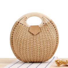 This handcrafted straw rattan bag is designed for the fashion-conscious individual. Made from 100% natural materials, it is not only stylish but also environmentally friendly. With its unique texture and sturdy construction, it will complement any outfit and withstand the test of time. Elevate your style with this versatile and sustainable handbag. Experience the perfect blend of style and functionality with our Fashion Straw Rattan Bag Handbag. Made with high-quality straw and rattan materials, it effortlessly adds elegance to any outfit. Its spacious interior allows for easy organization and storage of your essentials. Elevate your fashion game with this must-have accessory. Rattan Handbags, Straw Beach Bag, Straw Handbags, Rattan Bag, Woven Tote Bag, Trending Handbag, Casual Tote, Types Of Bag, Woven Bag