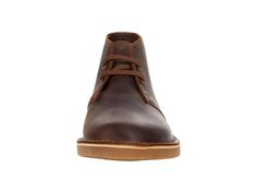 If you're looking for a shoe that delivers comfort, quality, and style, the Clarks® Bushacre 3 desert boot is a perfect match. This lace-up chukka provides lasting comfort with its cushioned footbed and ankle-height topline..Made of leather or suede with synthetic linings and a cushioned footbed..Durable rubber outsole..Imported..Product measurements were taken using size 9.5, width EE - Wide. Please note that measurements may vary by size..Measurements: Weight: 1 lb 4 oz Casual Lace-up Hiking Boots With Leather Sole, Casual Work Boots With Textured Sole And Round Toe, Casual Work Boots With Textured Sole, Casual Brown Lace-up Boots For Walking, Casual Chukka Boots With Leather Footbed, Casual Moc Toe Desert Boots For Walking, Casual Leather Lace-up Boots With Textured Sole, Casual Plain Toe Lace-up Boots, Casual High-top Lace-up Boots With Cushioned Footbed