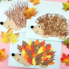 two hedgehogs with autumn leaves on them are cut out to look like acorns