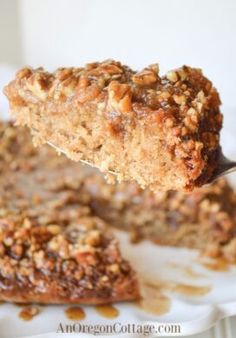 sticky bun sourdough coffee cake on a white plate with a spoon in it