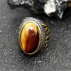 Material: Alloy Color: Yellow-Oval Tigereye-Ring Style: Europe and America Tigers Eye Gem, Mens Stainless Steel Rings, Womens Retreat, Retro Ring, Emotional Body, Estilo Punk, Eye Ring, Tiger Eye Stone, Eye Stone