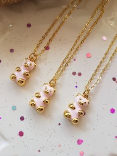 Just love this Adorable Teddy Bear necklace, such a cute little Teddy Bear. A lovely gift for the Girl of any age, it truly is a sweet Teddy Bear which is 18K Gold plated ( 18K Gold plated over Brass ) and Baby Pink coloured enamel to the front of the bear only. This Adorable Teddy Bear necklace is delightful and would make a wonderful present, Birthday Gift or a lovely Christmas present. The cable chain is a 18K Gold plated over copper and is 18 inch in length. The Teddy Bear charm is approx 17 Dainty Pink Charm Necklace With Adjustable Chain, Personalized Kawaii Jewelry For Birthday, Kawaii Gold Nickel-free Jewelry, Kawaii Nickel-free Gold Jewelry, Gold Nickel-free Kawaii Jewelry, Handmade Pink Jewelry Gift, Handmade Necklaces For Best Friend Gift On Valentine's Day, Handmade Necklace For Best Friend Gift On Valentine's Day, Nickel-free Cute Jewelry For Party