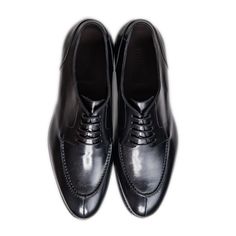 Ready to conquer the day? We’ve taken our timeless split toe derby silhouette and made it deep, dark, and black. This is a traditional, rich and refined shoe has an edge over the classic cap toe oxfords. We’ve also made this dress shoe with a Dainite sole so you can wear them all year round. Whether it's a formal events, or a night out with friends this is the perfect allrounder. Upper: Full-grain Italian leather Sole: Dainite lugged sole, British made* Construction: 360° Storm Goodyear welt (Re Formal Lace-up Shoes With Goodyear Welted Cap Toe, Formal Lace-up Shoes With Goodyear Welt And Cap Toe, Formal Wingtip Loafers With Rubber Heel Cap, Timeless Business Casual Cap Toe Lace-up Shoes, Timeless Cap Toe Oxfords For Business Casual, Semi-formal Goodyear Welted Cap Toe Lace-up Shoes, Formal Oxford Lace-up Shoes With Goodyear Welt, Formal Cap Toe Lace-up Shoes With Goodyear Welt, Semi-formal Plain Toe Oxfords With Rubber Heel Cap