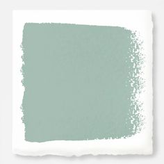 a light blue paint swatch on a white background